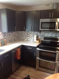 Newly refinished kitchen after fire damage. Marysville Full Reconstruction Service