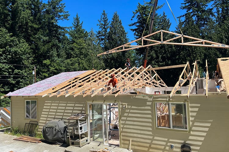 McCarthy Team replacing a roof. roof restoration & replacement Everett